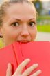 woman with red book