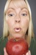 Beautiful Woman With Apple