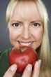 Beautiful Woman With Apple