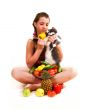 Girl with fruit and a cat