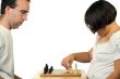Father Daughter Playing Chess