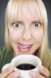 Beautiful Woman Enjoys Coffee
