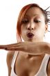 woman blowing hand