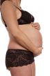 hand hold pregnant belly
