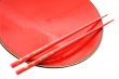 Red dish and chopsticks with oriental style