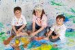 Children playing with painting