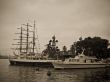 Sailing boat and warship