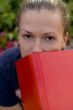 woman with red book