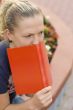 woman with red book