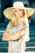 Blond Woman Wearing Sun Hat