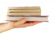 hand holds different books