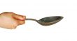 hand holds spoon