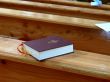 Bible on a pew