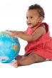 Baby girl with a globe of the world