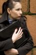 business woman holding portfolio