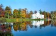 Classical building near the pond in autumn