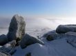 Sheregesh. Big stone on top of mountain.