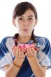 Cute girl blowing petals