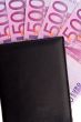 Purse full of notes of euros