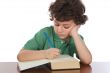 Adorable child write in book
