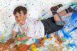 Boy playing with painting