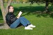 Man Reading Outside