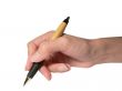 The female hand writes a pen. Isolated.