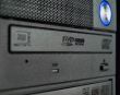 Computer base unit with optical storage