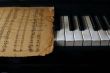 Keyboard of the piano and old notes