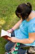 Child Reading A Novel