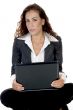 female holding laptop