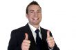 young happy businesssman and showing thumbsup