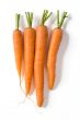 Fresh carrots on white
