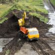 The dredge and the dumper truck