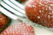 strawberry, sugar and fork