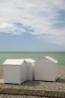 White beach cabins