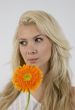 close-up of gorgeous woman holding gerbera
