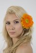 close up of young woman with flower