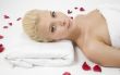pretty laying woman with rose petals
