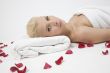 laying lady with rose petals