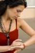 woman checking the time on her watch