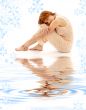 relaxed lady on white sand