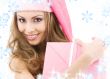 cheerful santa helper girl with gift box