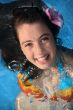 Happy girl in a pool