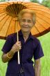 old Asian woman with parasol
