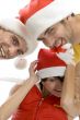 beautiful young people with santa hats
