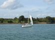 Sailing vessel on an ocean gulf in the afternoon 
