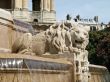 Sculpture of a lion on a fountain on the area in Paris