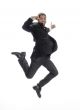 businessman leaps in air