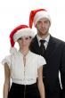 young couple with santa hats